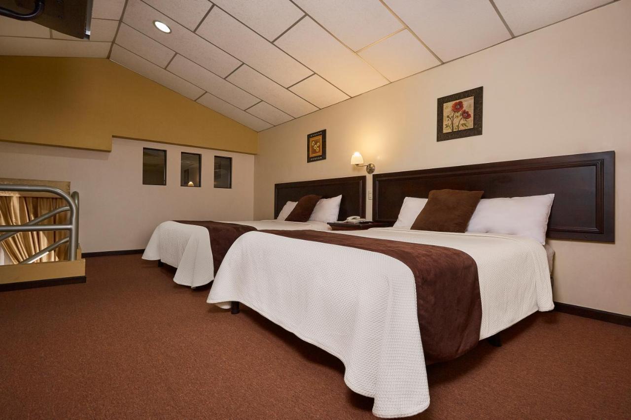 Hotel Podocarpus Лоха Екстериор снимка