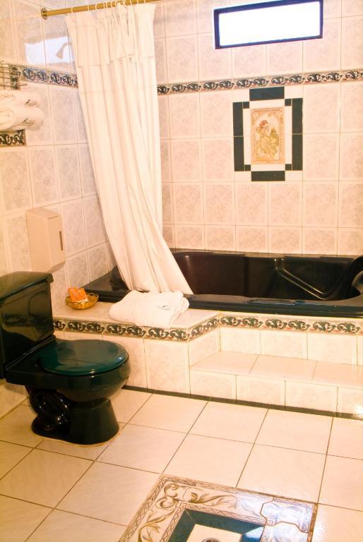 Hotel Podocarpus Лоха Екстериор снимка